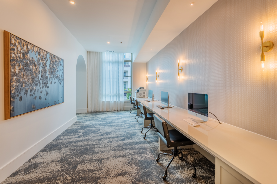 Our business center provides temporary work space for residents