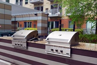 Grilling station Lagoon Avenue Apartments in Minneapolis, MN | Flux Apartments | grilling station - Photo Gallery