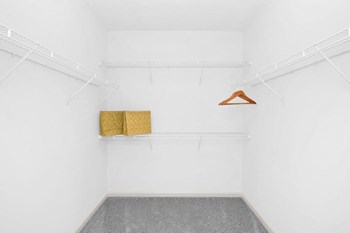 Closet Midtown apartments near Piedmont Healthcare - Gramercy at Buckhead walk-in closet - Photo Gallery 5