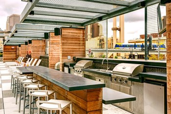 North Loop Apartments for Rent in Minneapolis, MN | Junction Flats | outdoor grill - Photo Gallery 9