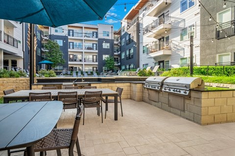 Onsite grill with dining tables and seating