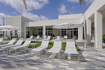 The District Boynton - Apartments near West Palm Beach - sundeck with hammocks - Photo Gallery 10