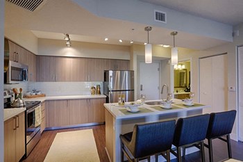 Kitchen The District Boynton - Apartments near Boca Raton - modern kitchen with USB ports - Photo Gallery 5