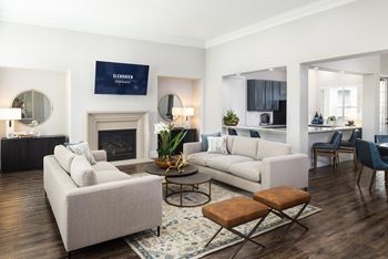 A living room with a fireplace and a couch.