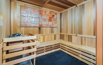 A room with wooden walls and benches.