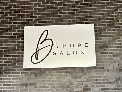 A white sign with the word