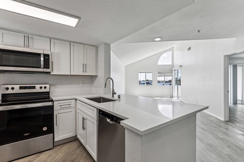 the preserve at ballantyne commons apartment kitchen with stainless steel appliances