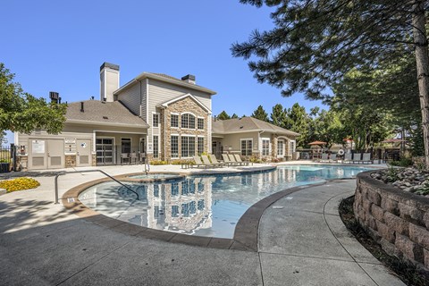 The Ridge at Lowry outdoor pool with relaxing seating
