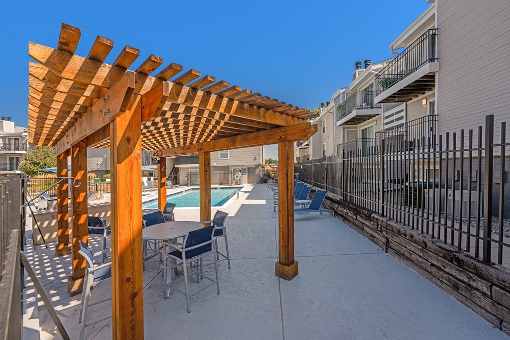 The Huntington Pool and cabana with seating