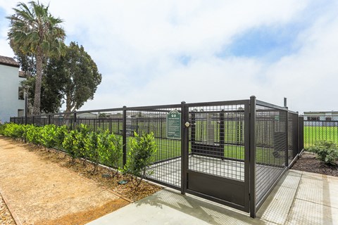 Newport Palms Apartments Pet Park Gate and Entrance