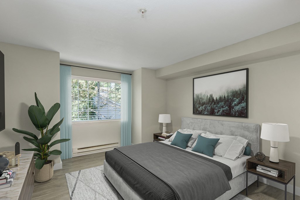 a bedroom with a large bed and a large window