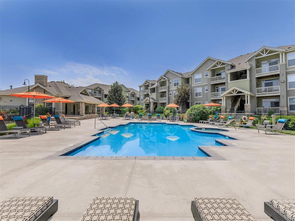our apartments have a resort style swimming pool with umbrellas