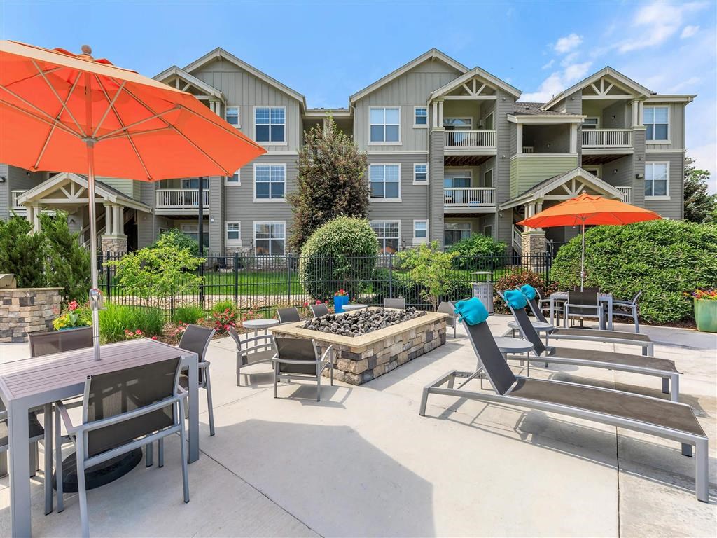 our apartments offer a large patio with umbrellas and tables