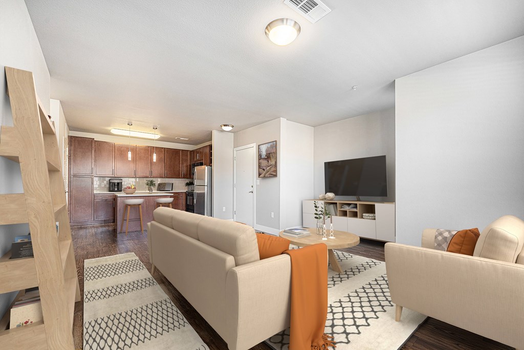 A living room with a couch and a television.