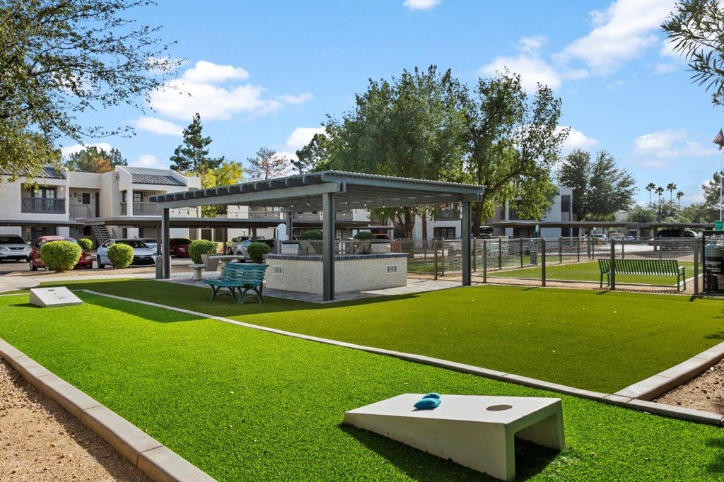 Del Sol Apartments Courtyard with BBQ's and Corn Hole