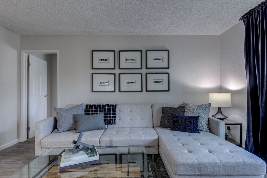 a living room with a couch and a coffee table