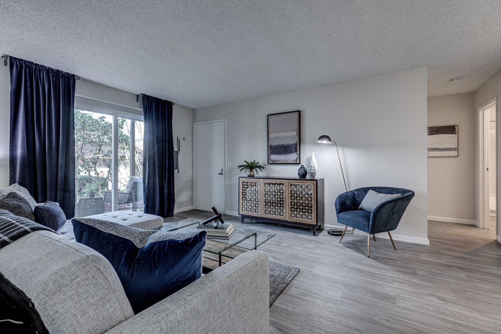 a living room with a couch and a chair