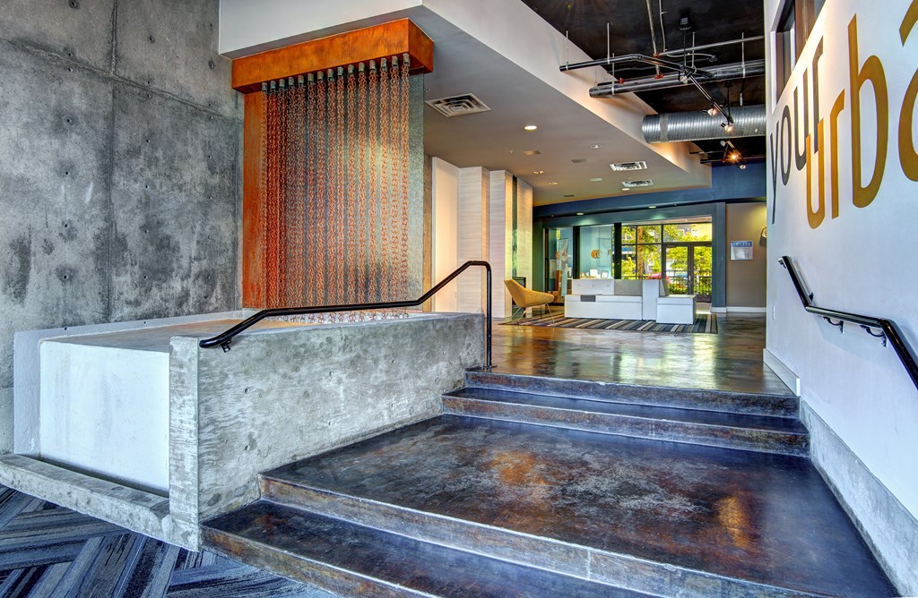 a view of the lobby from the top of the stairs