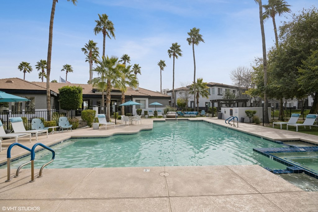the swimming pool at the enclave apartments