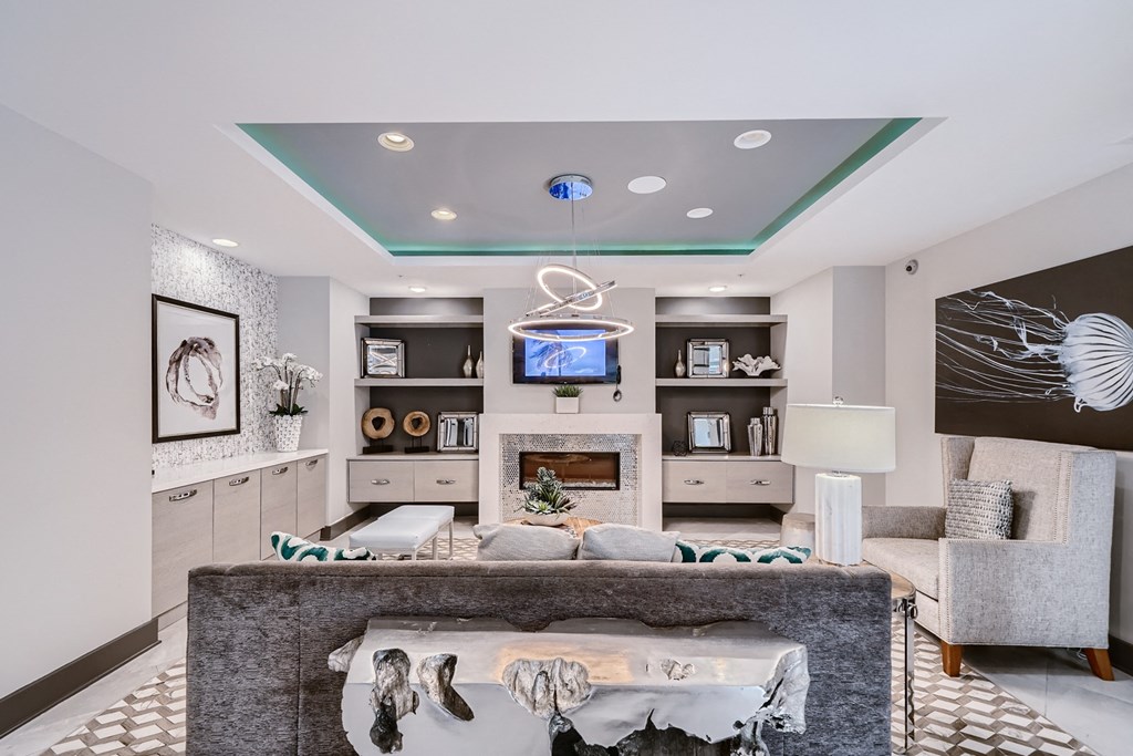 a living room with a couch and a fireplace