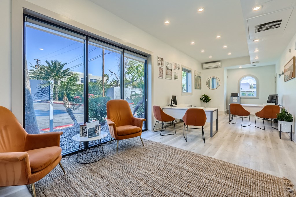 the preserve at ballantyne commons community living room with large windows