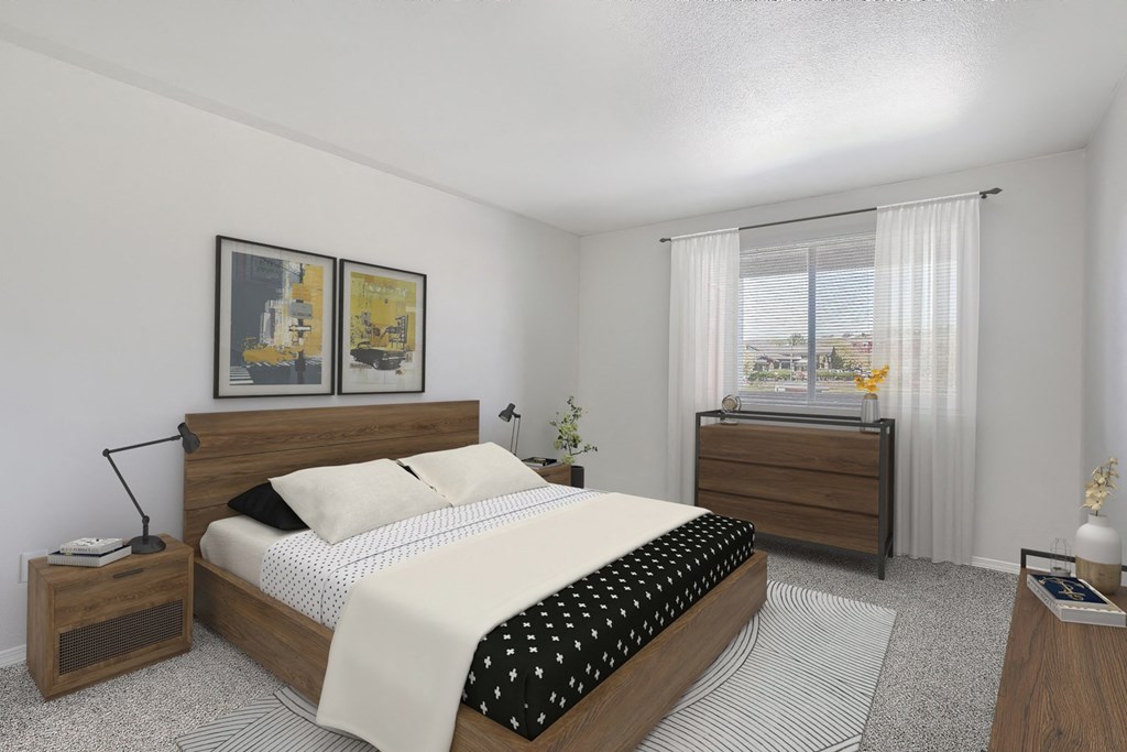 an image of a bedroom with a bed and dressers