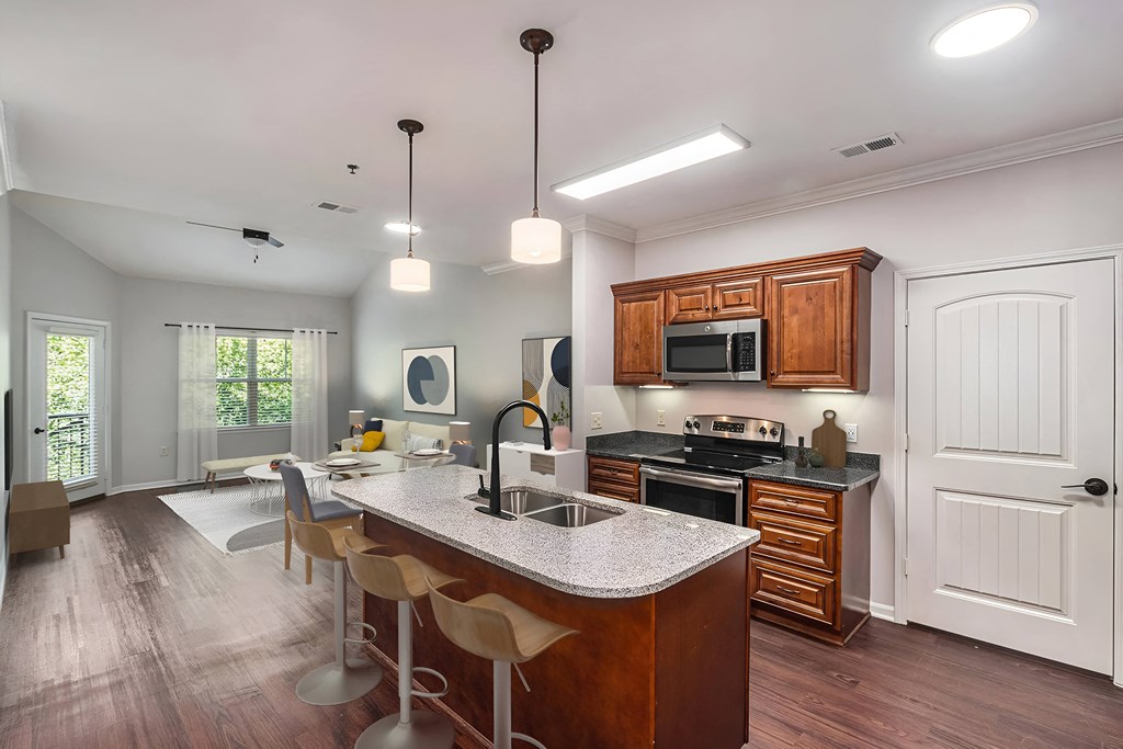a kitchen with a large counter top and a sink