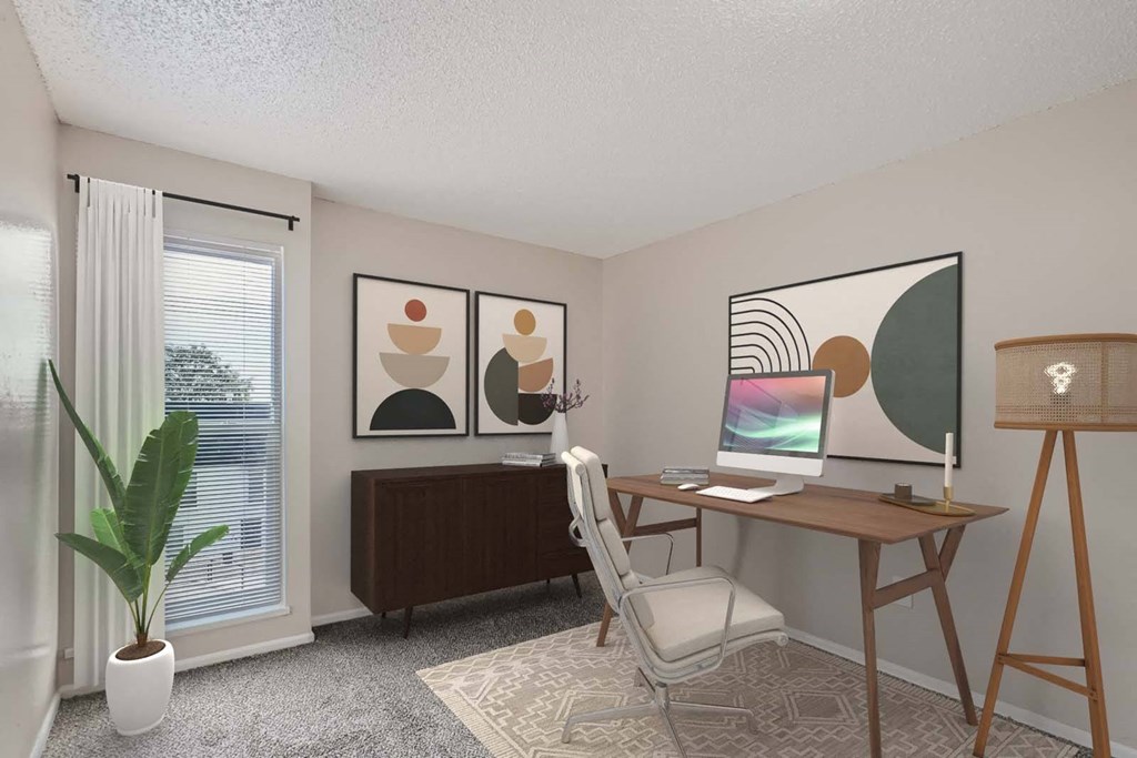 a home office with a desk and a computer