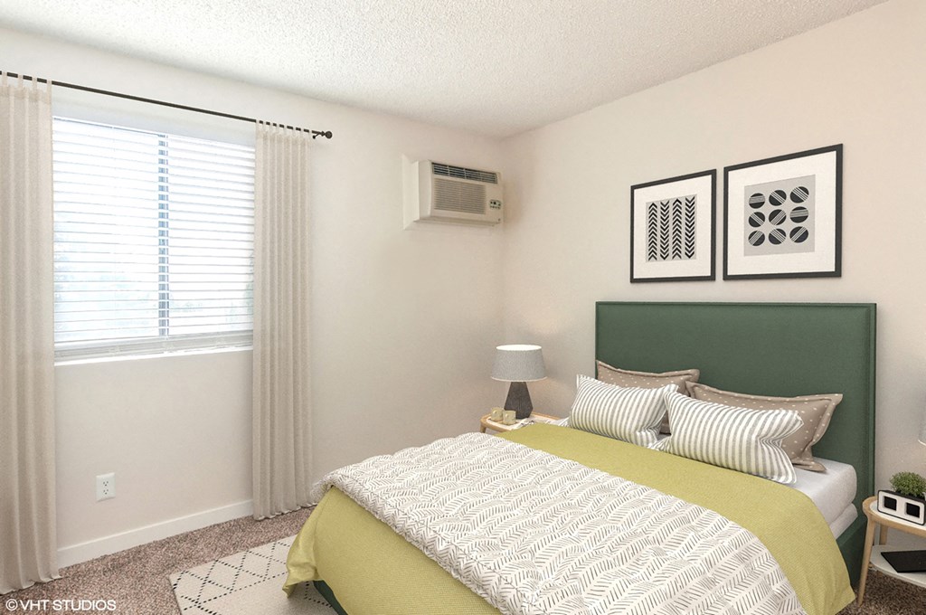 a bedroom with a bed and a air conditioner