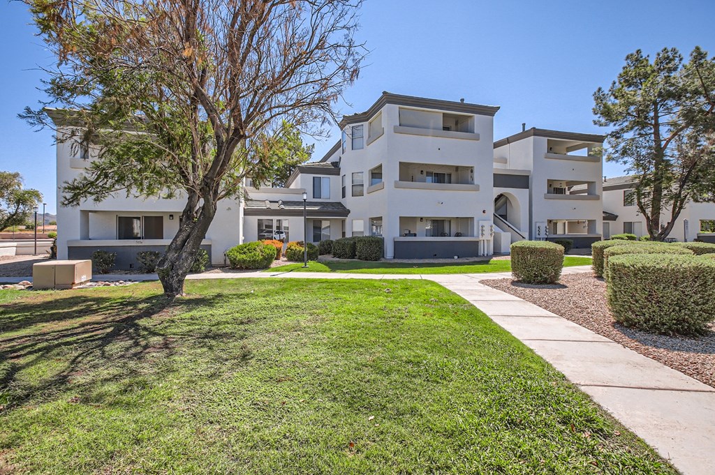 a view of the apartments from the street