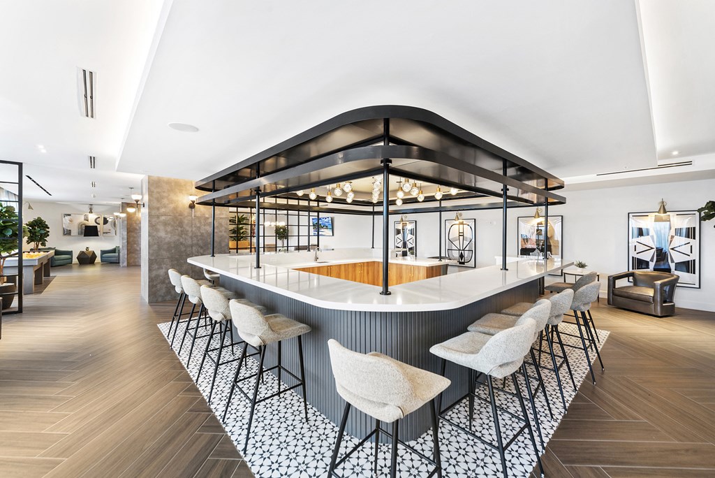 a rendering of a restaurant with a large counter and chairs