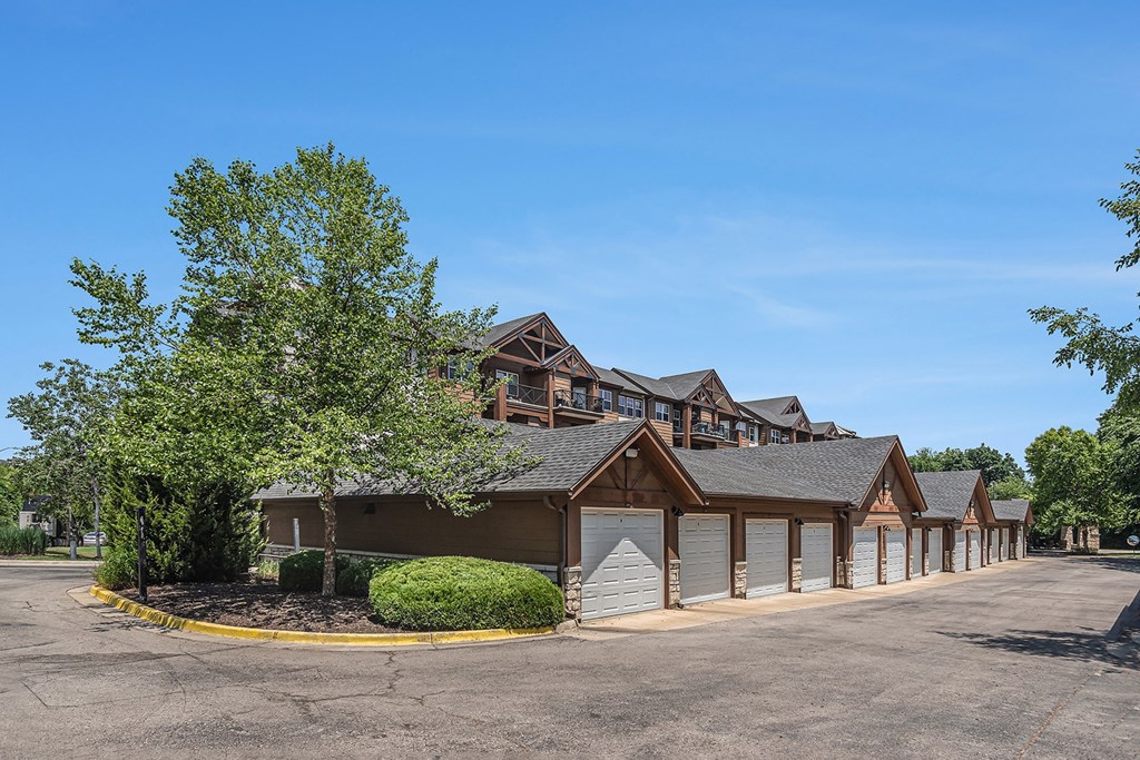 a large building with a parking lot in front of it