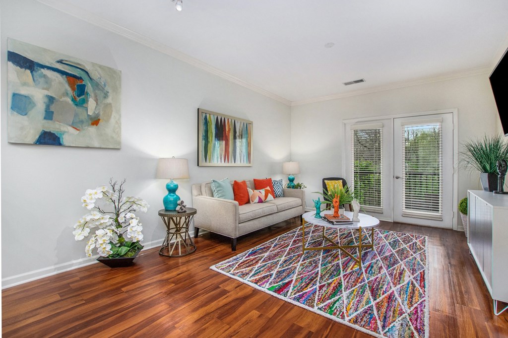 a living room with a couch and a table