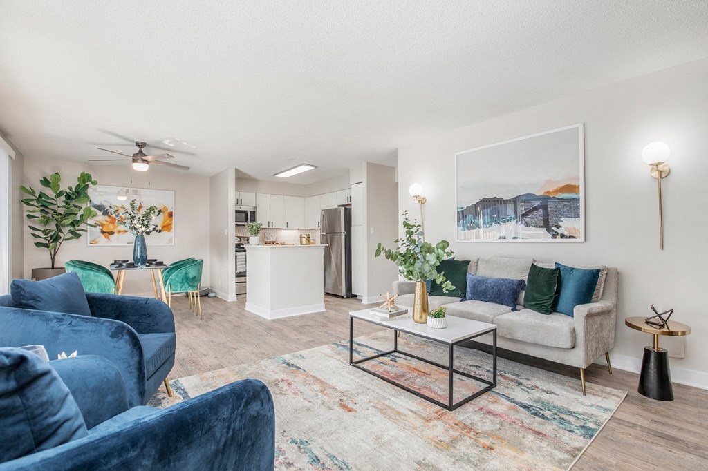 a living room with couches and a coffee table