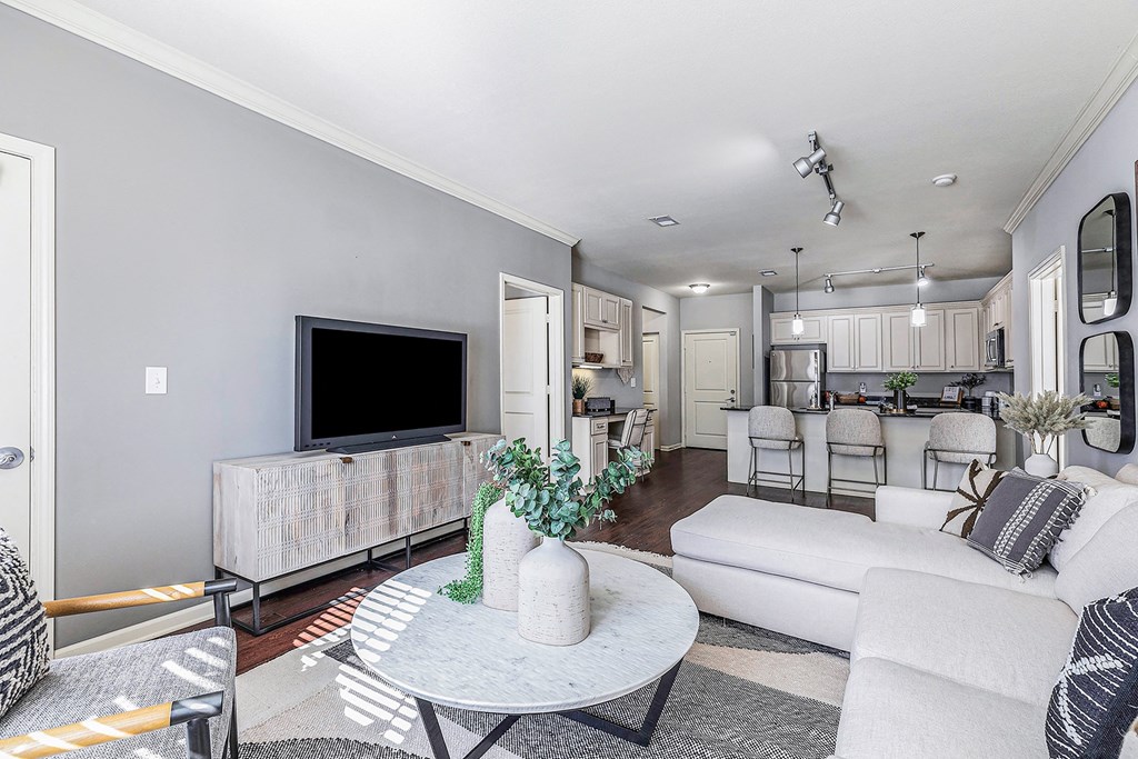 a living room with a couch and a table