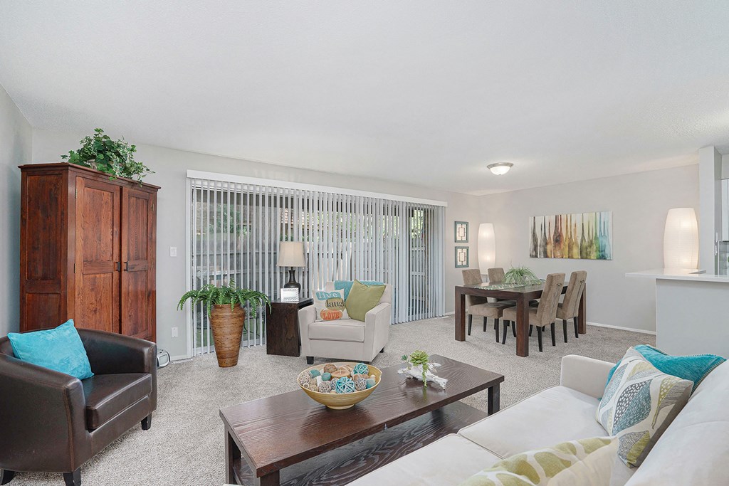 a living room with a couch and a table