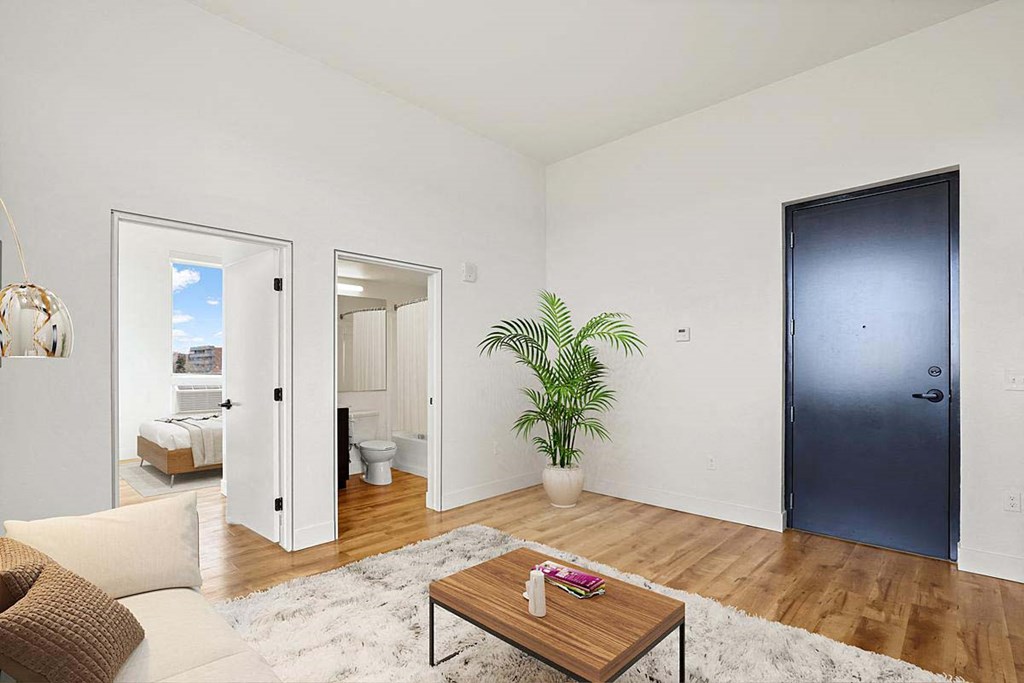 a living room with a couch and a table