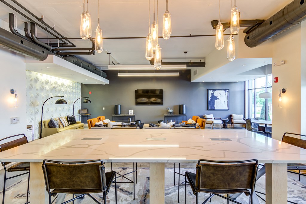 a large meeting room with a large table and chairs