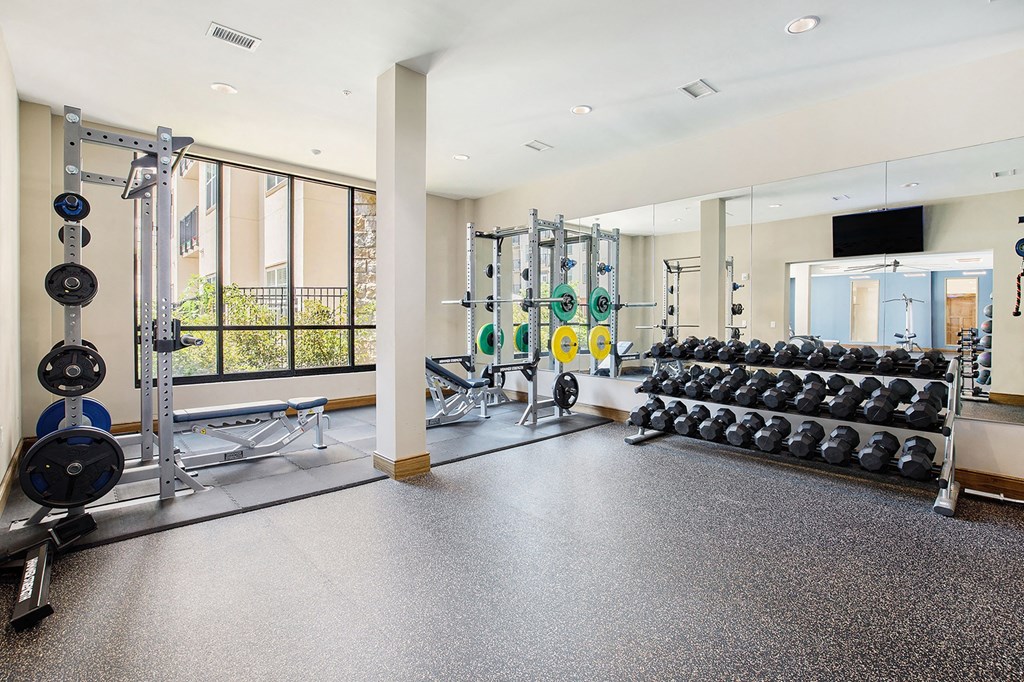 the gym at the grove condos has weights and cardio equipment