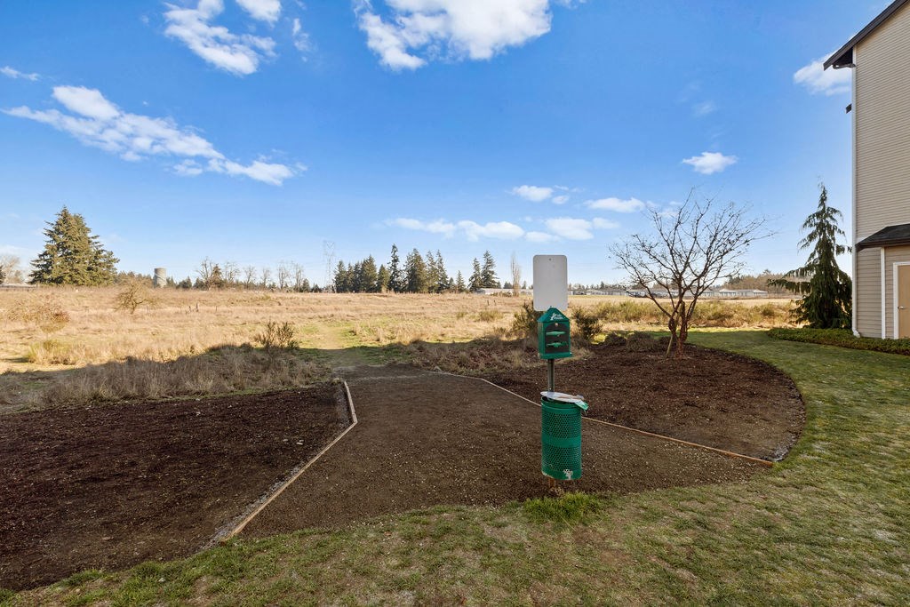 Backyard walking path at Tustin Apartment Homes, Yelm, WA, Washington , 98597