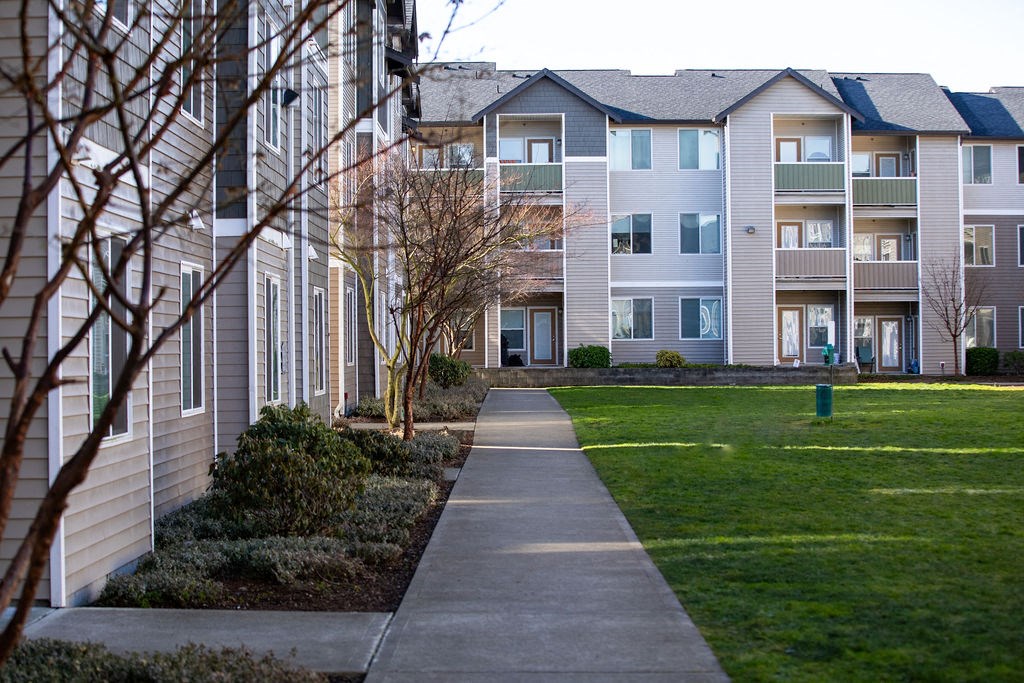 Community Exterior and Green Walkways at Tustin Apartment Homes, Yelm, WA, Washington , 98597