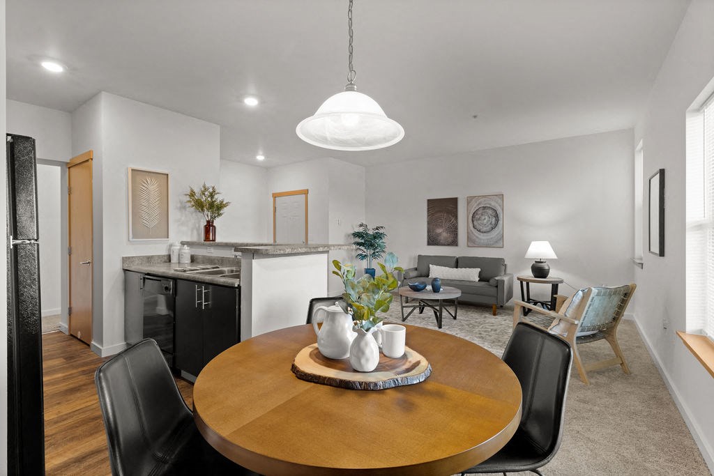 Fitted Kitchen With Island Dining at Tustin Apartment Homes, Yelm, WA