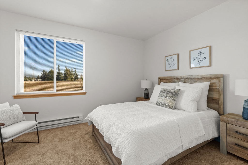 Beautiful Bright Bedroom With Wide Windows at Tustin Apartment Homes, Yelm, Washington