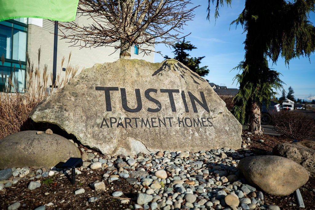 Welcoming Property Sign at Tustin Apartment Homes, Yelm