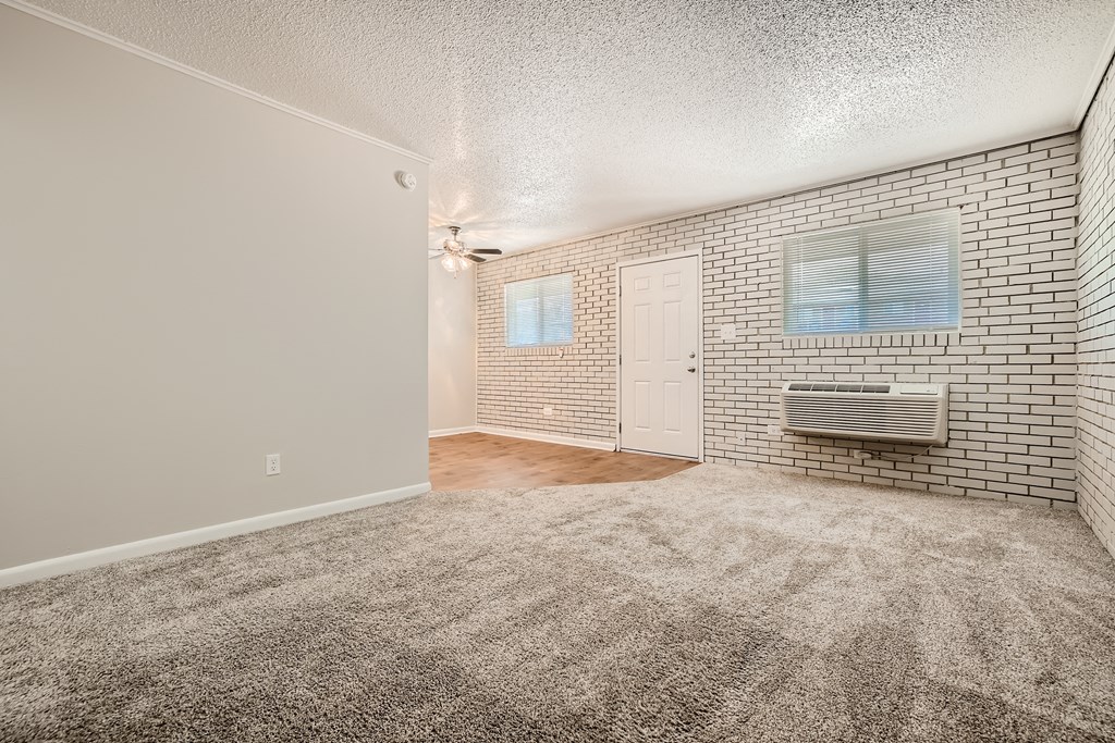 Living room with brick accent wall