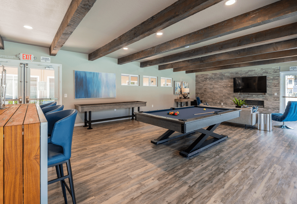 our games room is equipped with a pool table and a tv at Aspire Sacramento Apartments, Sacramento, CA