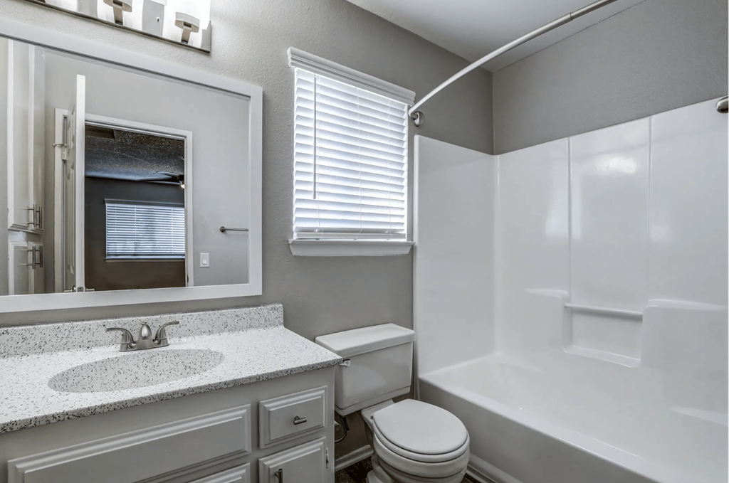 a bathroom with a sink and a toilet and a shower at Aspire Seneca, Victorville, 92392