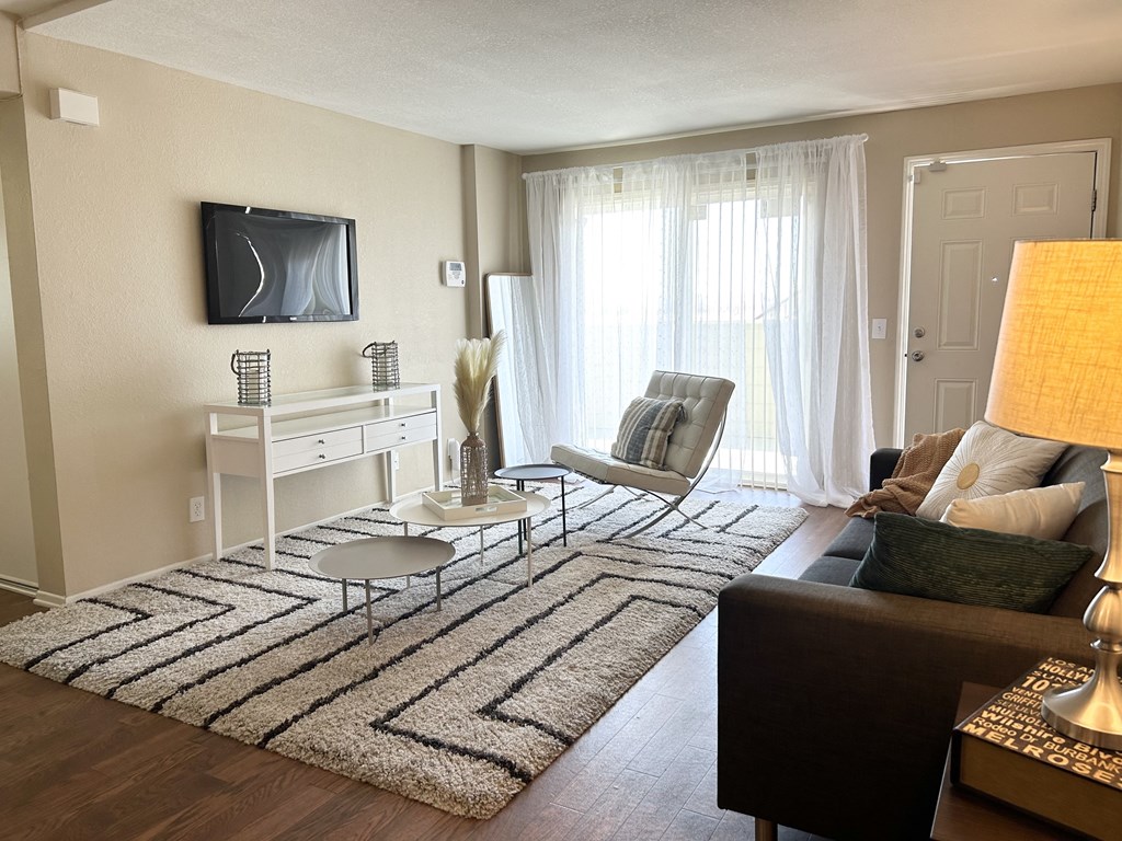 Living Room With TV at Aspire High Desert Apartments, Victorville, CA, 92392