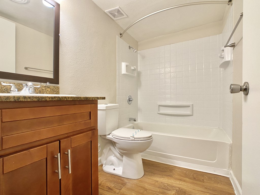 the preserve at ballantyne commons apartment bathroom with tub and toilet