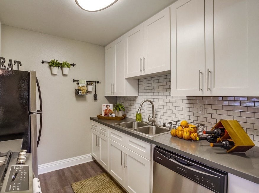 Apartments for Rent in Temecula- Vista Promenade- Stainless-Steel Appliances with Tile Backsplash and Modern-Style Cabinets at Vista Promenade Apartments, Temecula